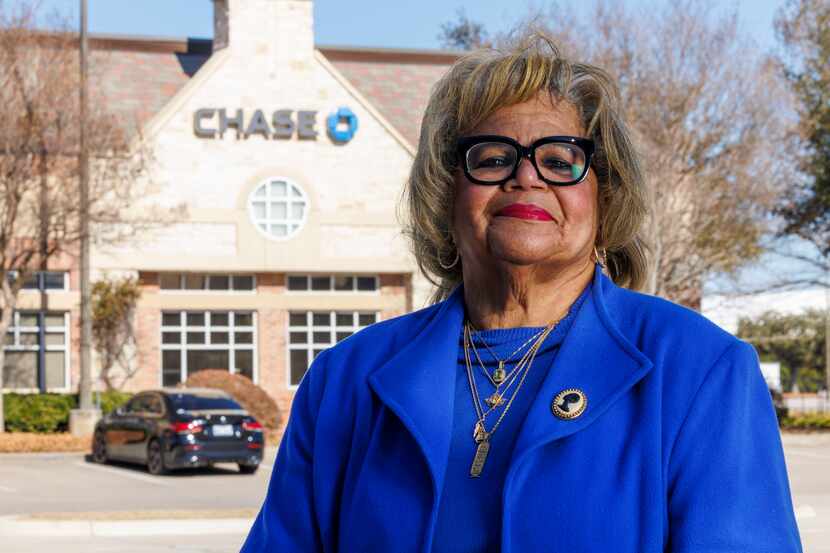 Shirley Ison-Newsome stands outside the Chase Bank in Far North Dallas where she tried to...