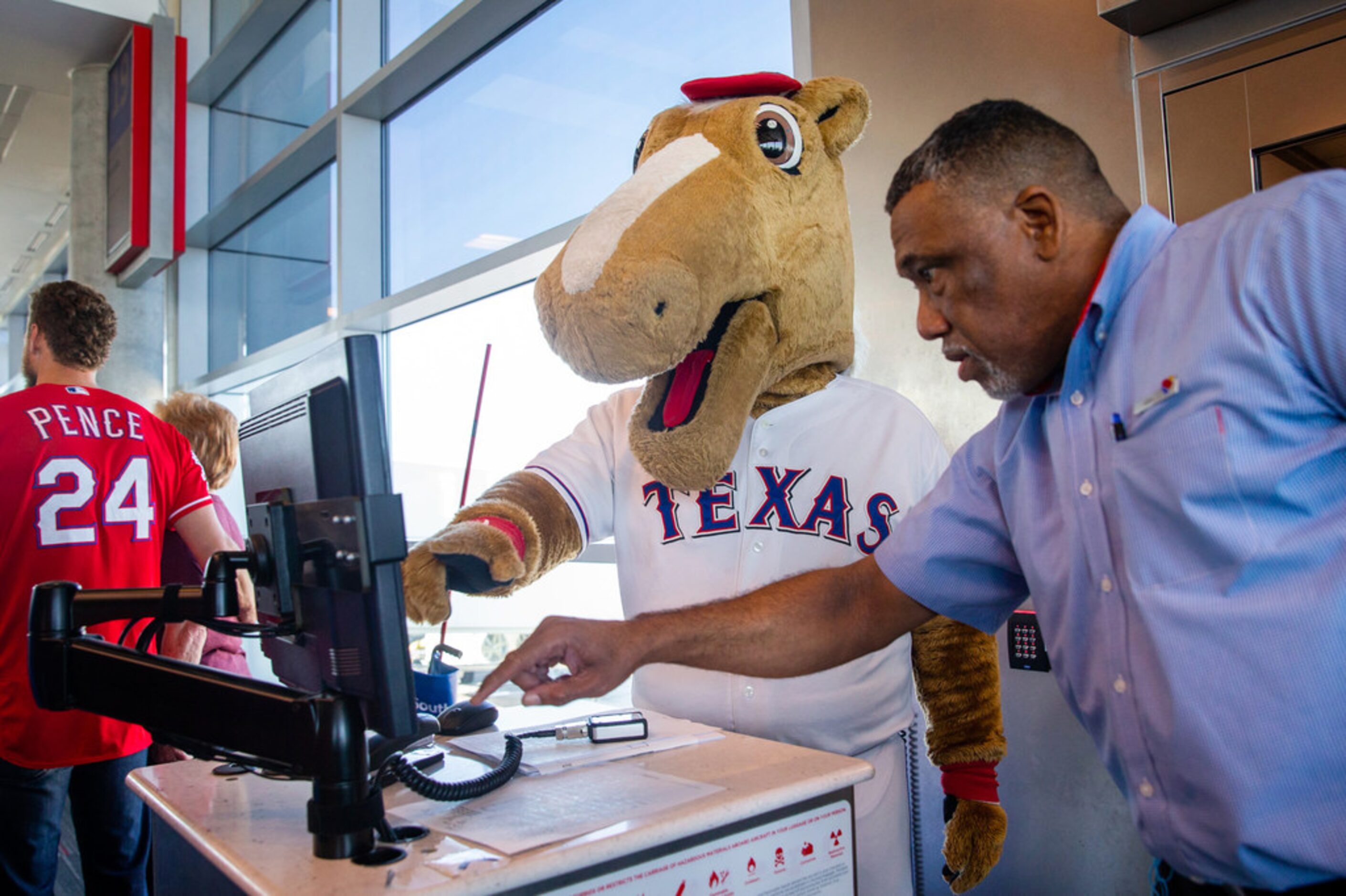 Rangers Captain learns how to board a flight with the help of Southwest Airlines employee,...