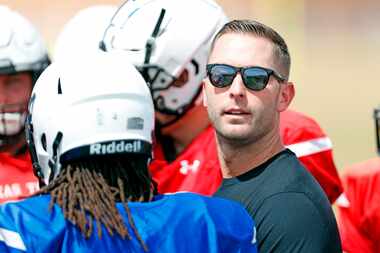 FILE - In this March 24, 2018, file photo, Texas Tech coach Kliff Kingsbury looks down the...
