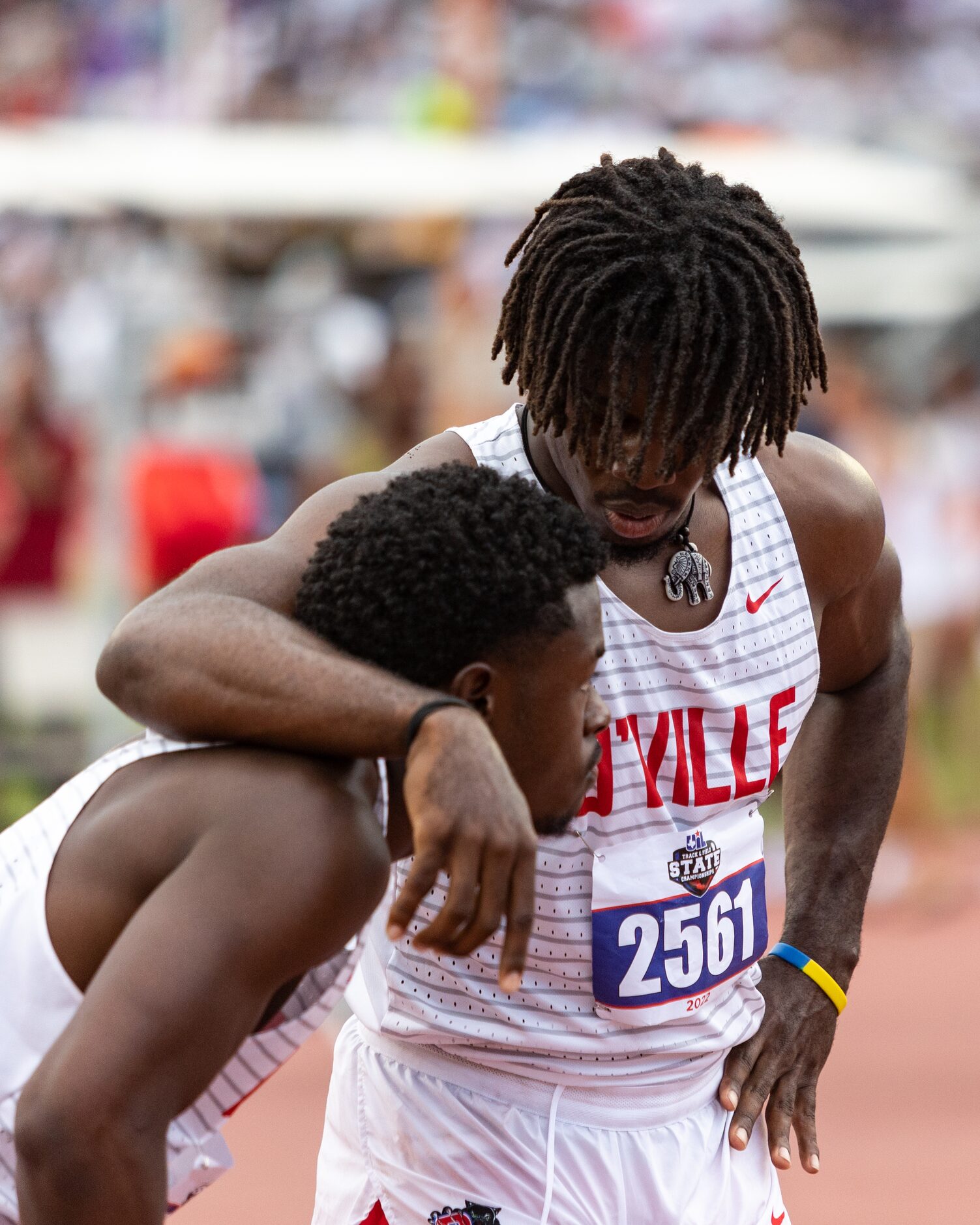 Duncanville’s Pierre Goree, right, wraps an arm around teammate Jaylen Washington after the...