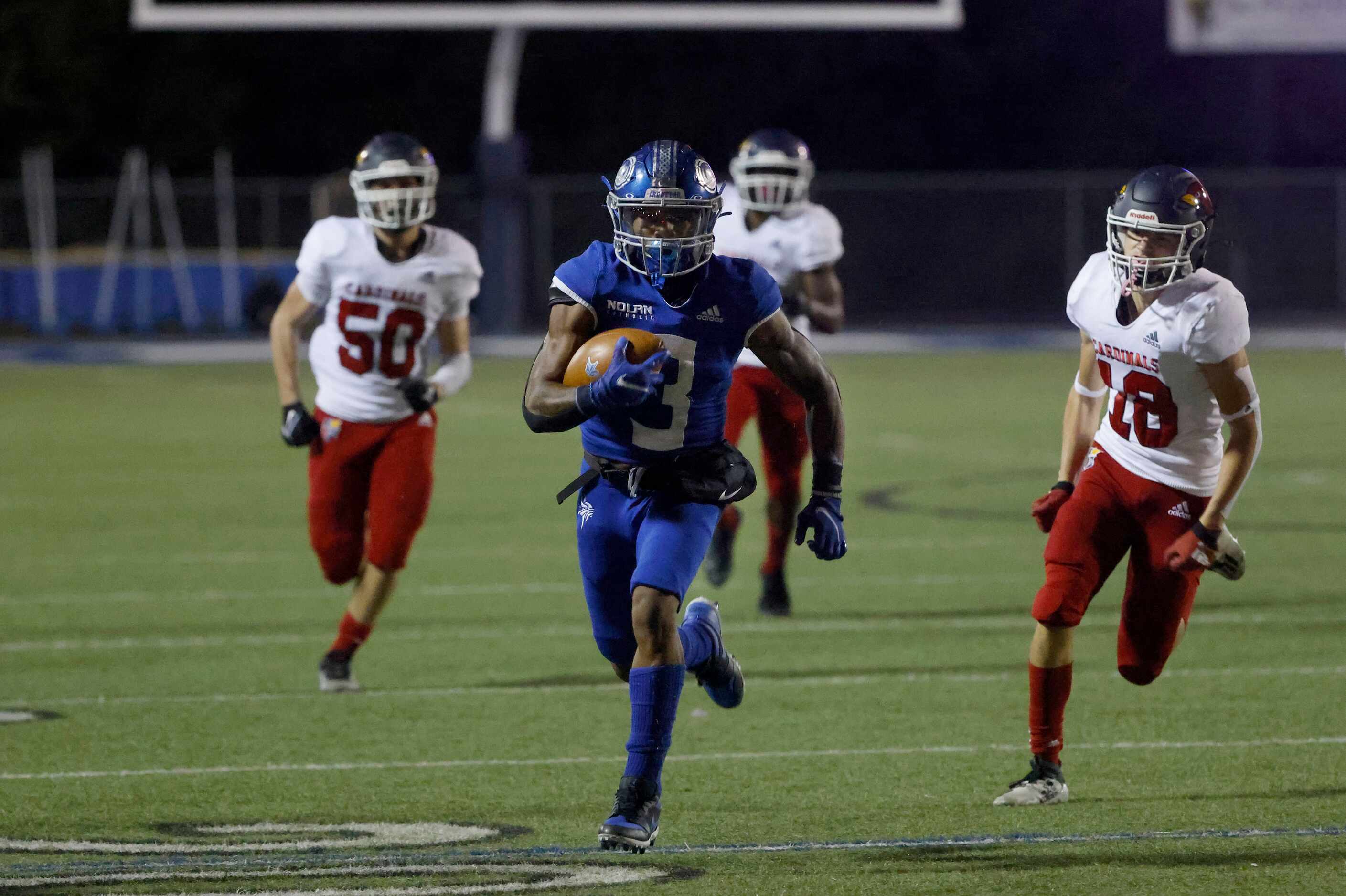 Nolan receiver Skyler Patterson (3) scores on a long reception and run as he is chased by ...