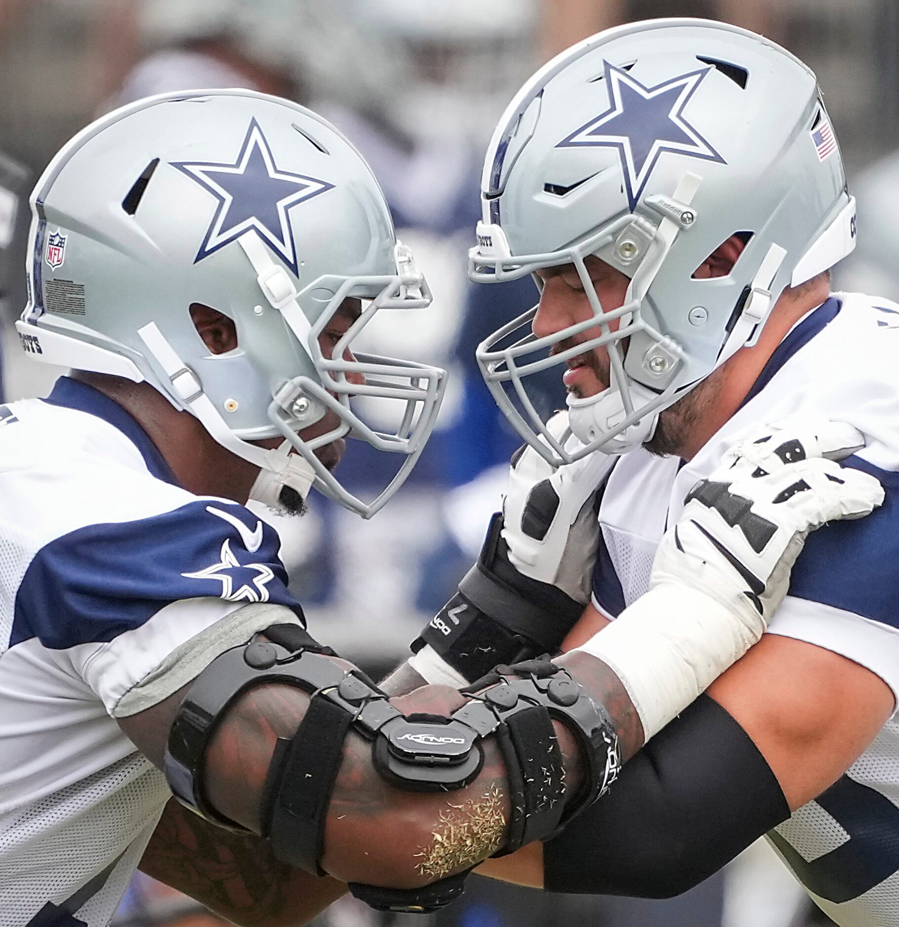 Dallas Cowboys tackle Tyron Smith (left) works against guard Zack Martin during a practice...