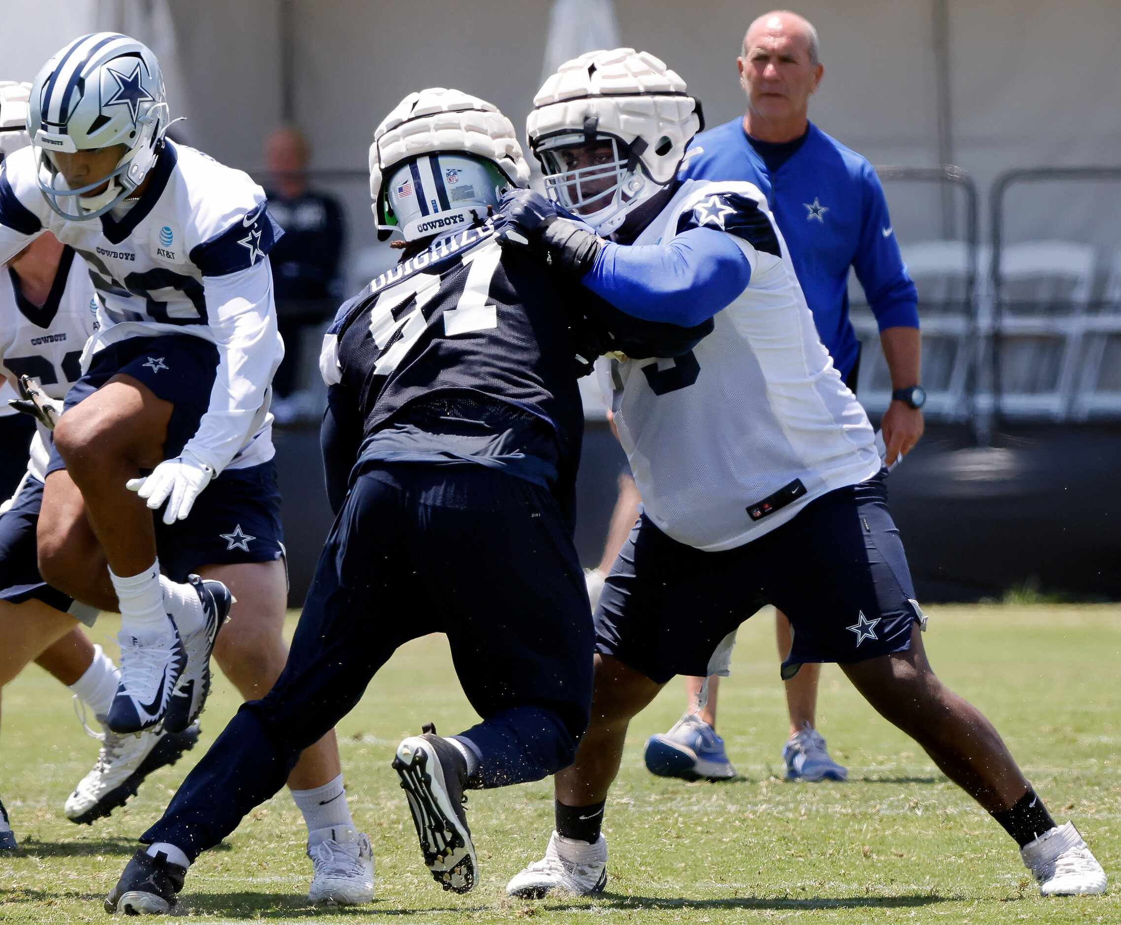 Dallas Cowboys rookie offensive tackle Tyler Smith (73) squares off against defensive tackle...