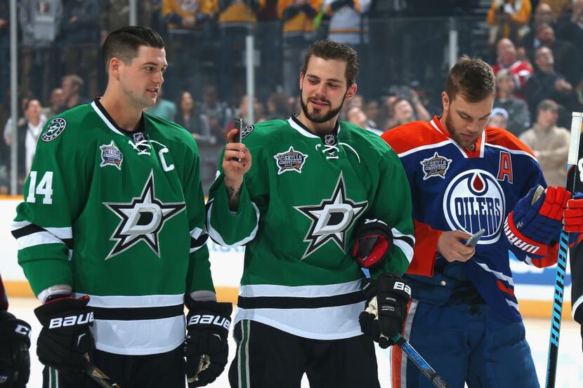 NASHVILLE, TN - JANUARY 30:  Tyler Seguin #91 of the Dallas Stars (C) takes a picture as...