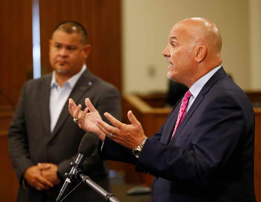 Fort Worth schools Superintendent Kent P. Scribner (right) answers questions about the first...