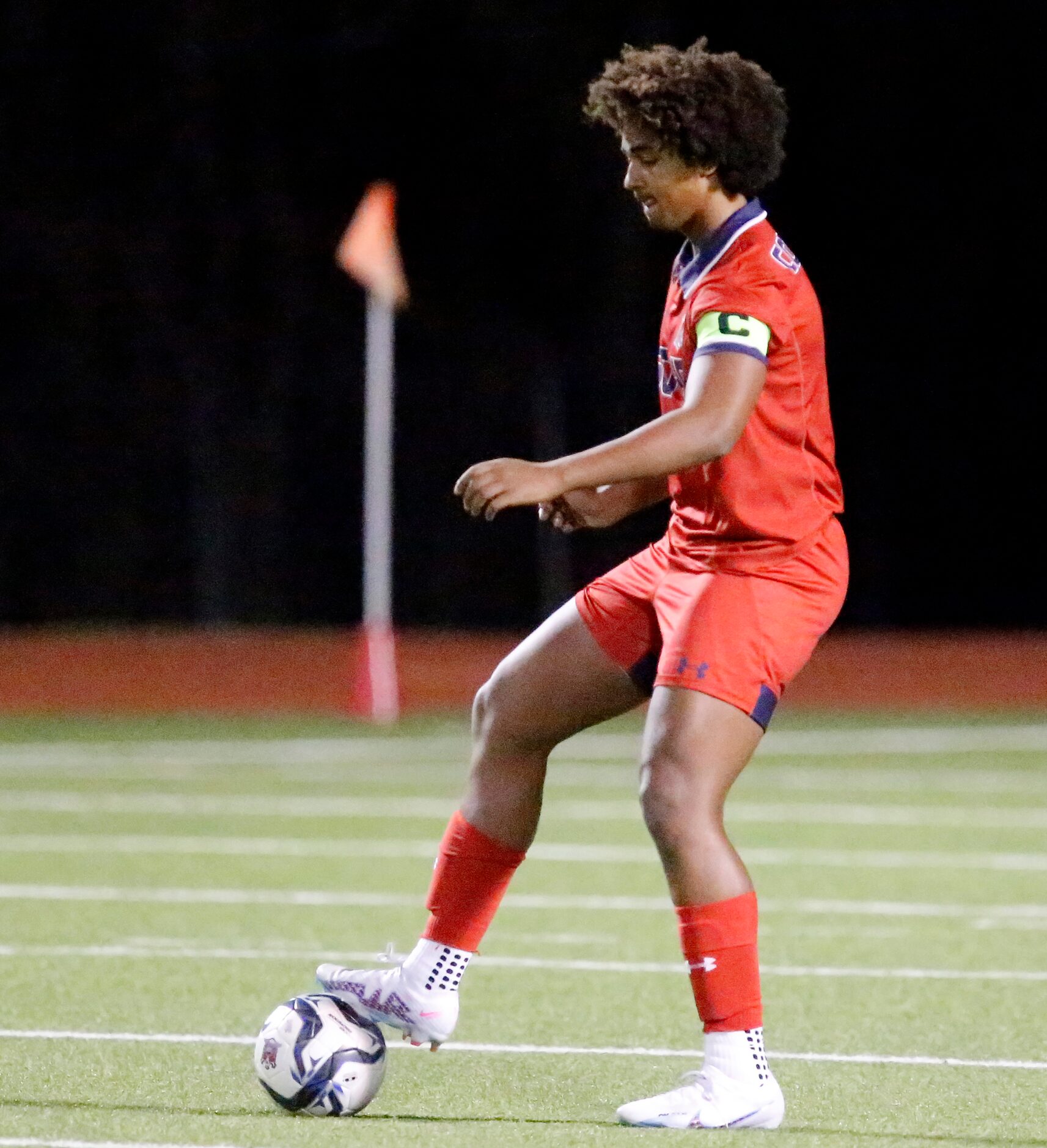 McKinney Boyd High School midfielder Caleb Sempebwa (3) stops the ball before making a pass...