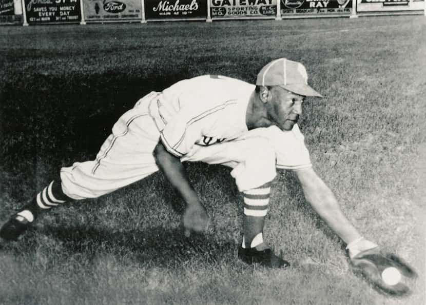 In this undated file photo released by the Negro Leagues Baseball Museum, Buck O'Neil...