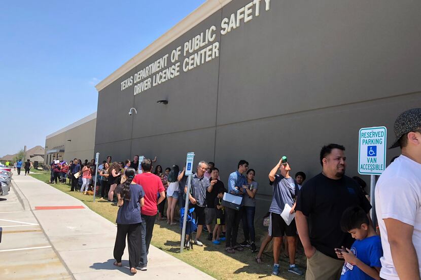 Long lines form at the Texas Department of Public Safety Driver License Mega Center in...
