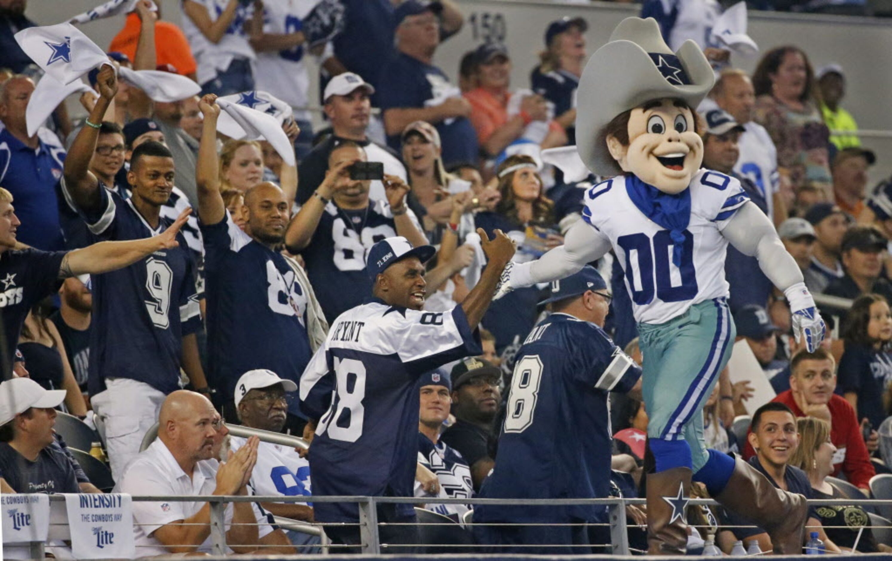 Dallas fans enjoy the vibe in the fourth quarter during the second half of play in the New...