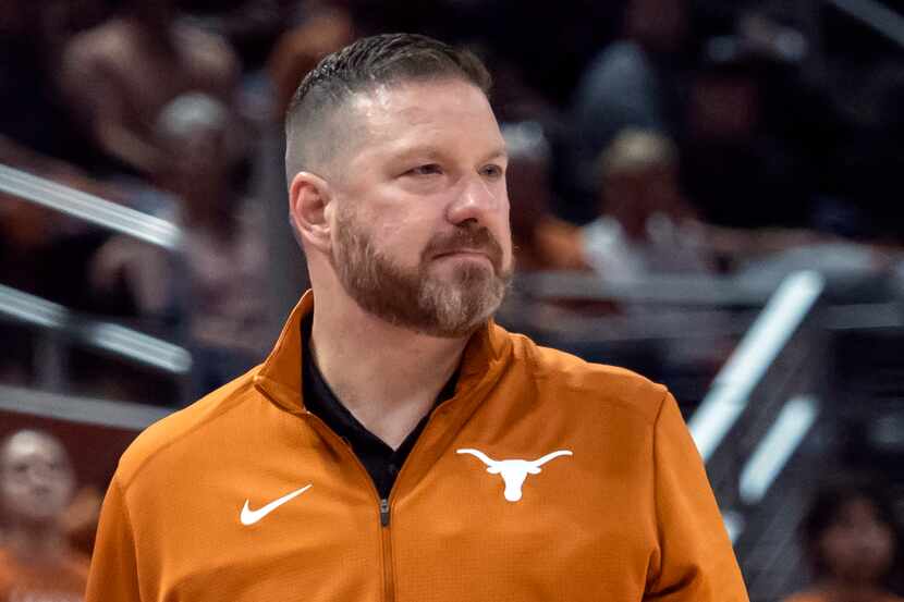 FILE - Texas head coach Chris Beard looks on during the first half an NCAA college...