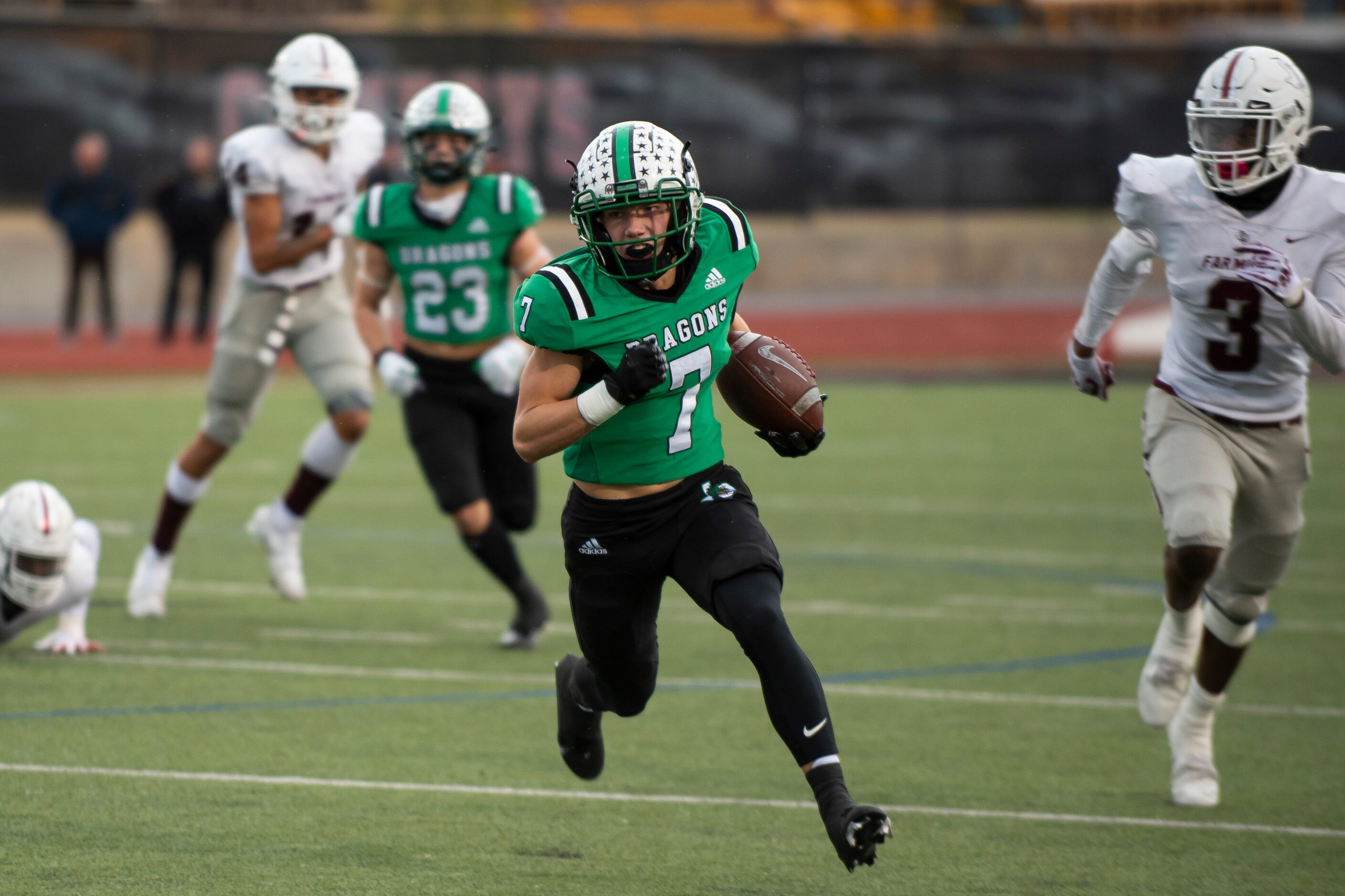 Southlake Carroll sophomore Jacob Jordan (7) rushes down the field to gain yardage during...