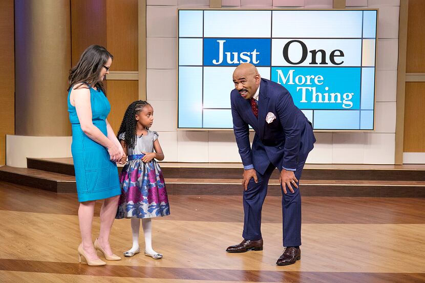 Host Steve Harvey talks with Maeve Madine, 6, of Dallas and her mother, Joanna.