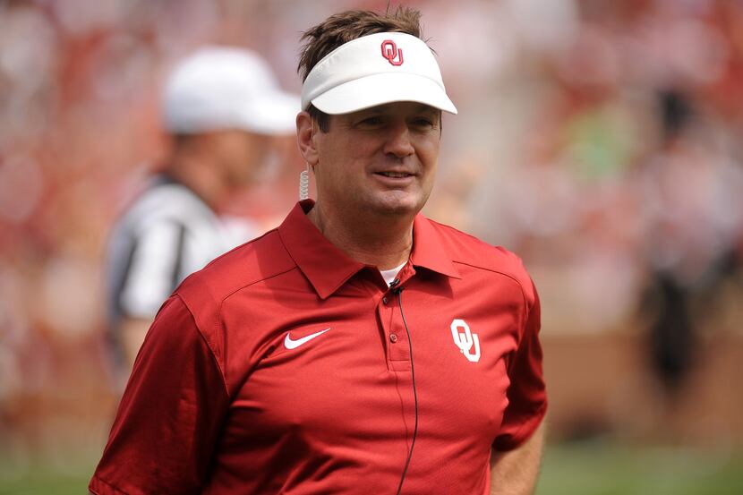 Apr 12, 2014; Norman, OK, USA; Oklahoma Sooners head coach Bob Stoops looks on during the...