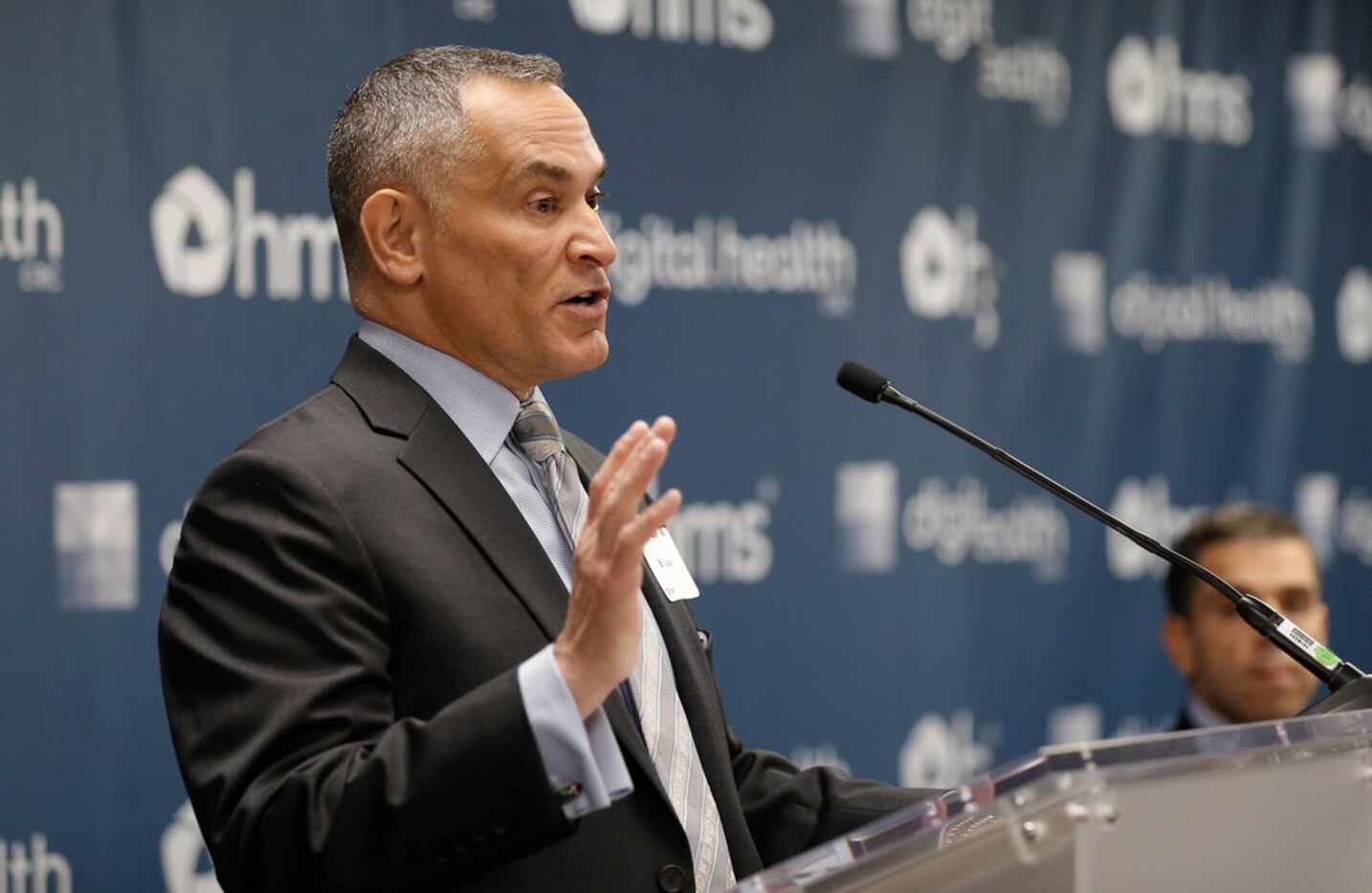 Bill Lucia, chairman and chief executive officer of HMS, speaks during a press conference...