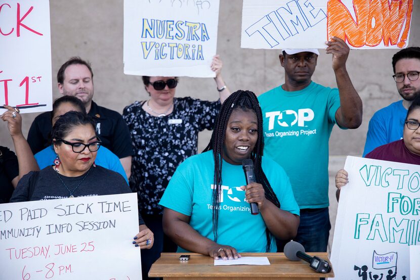 Community organizer Tempest McHenry gave remarks during a news conference outside Dallas...