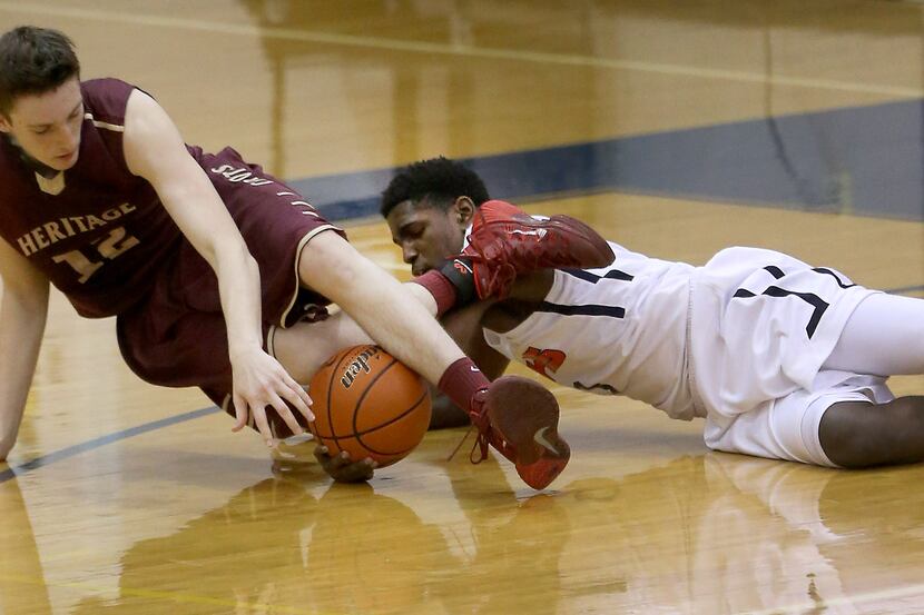 Frisco Heritage Coyotes forward  Jordan Marshall (12) scrambles for a loose ball with...