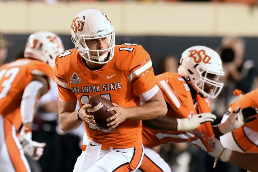 FILE - In this Saturday, Oct. 27, 2018, file photo, Oklahoma State quarterback Taylor...