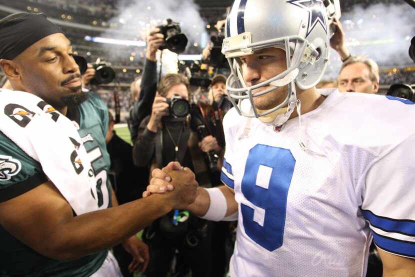 Donovan McNabb congratulates Tony Romo after the Cowboys defeated the Philadelphia Eagles...