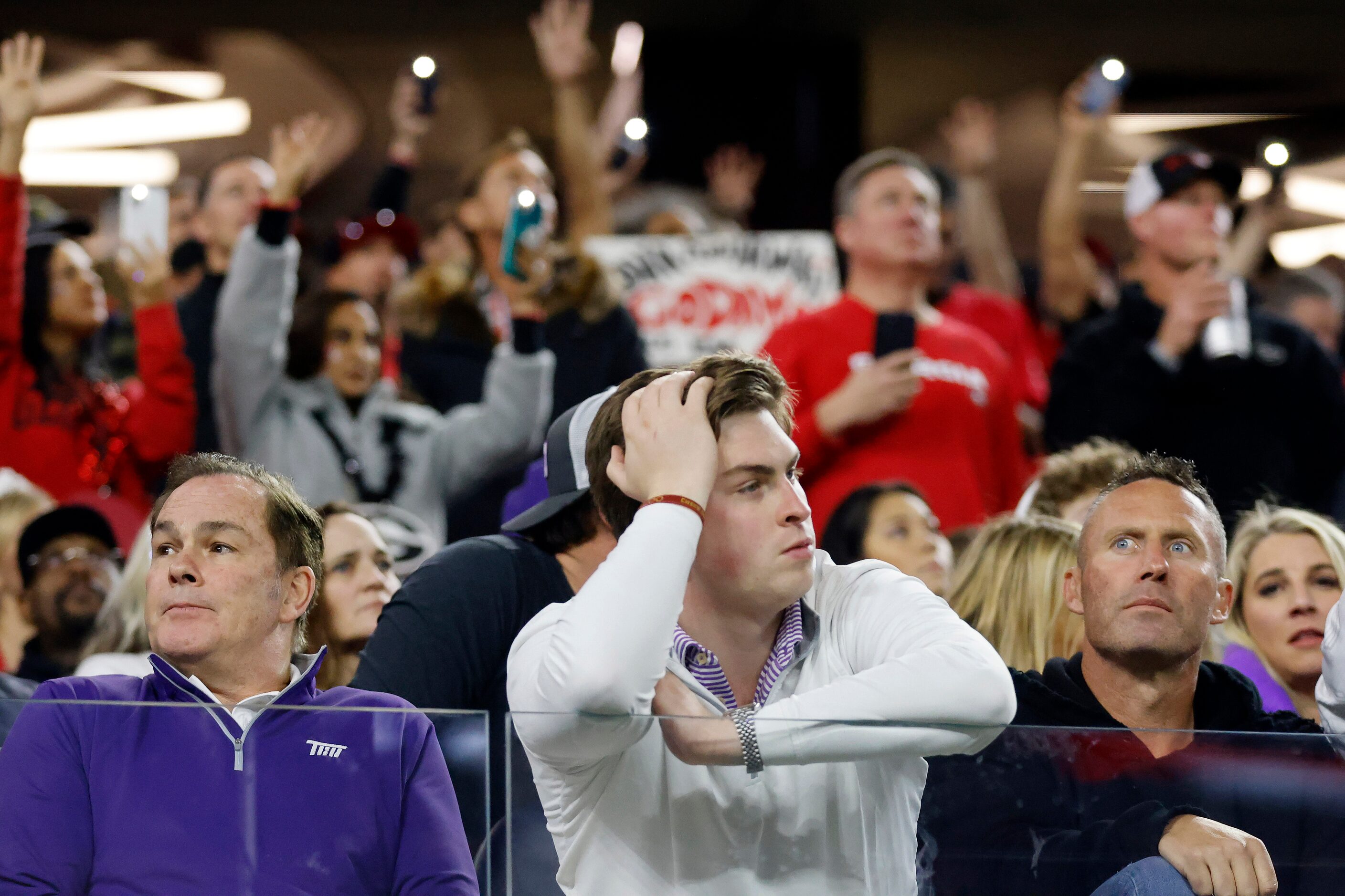 TCU Horned Frogs fans react as they trail the Georgia Bulldogs in the fourth quarter of the...