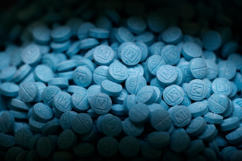 Hundreds of seized fentanyl pills that imitate Oxycodone M30 are kept as evidence at the...