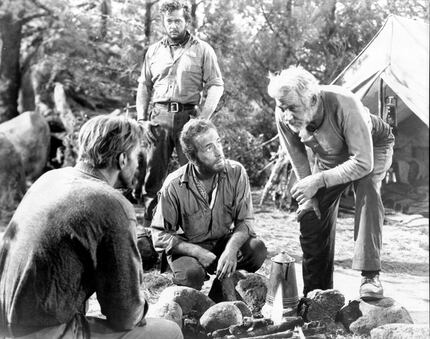 Clockwise from left: Bruce Bennett, Tim Holt, Humphrey Bogart and Walter Huston in "The...