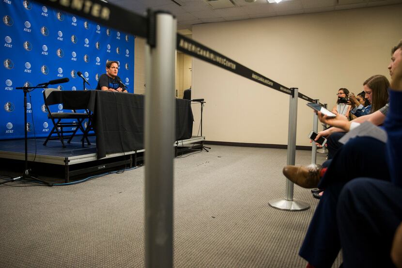 Dallas Mavericks owner Mark Cuban speaks to reporters in a postgame interview in March.
