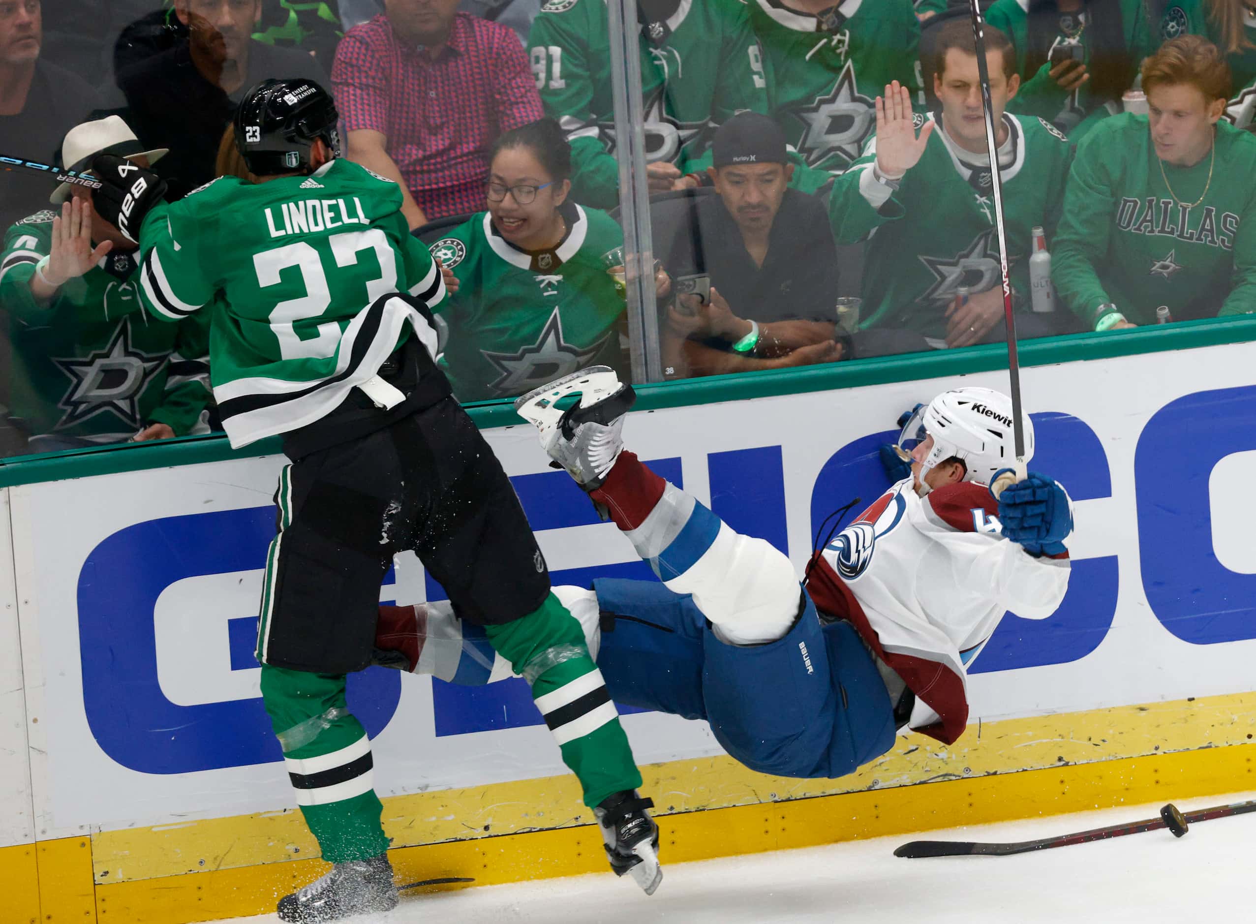 Colorado Avalanche defenseman Josh Manson (42) loses his balance after he collided with...