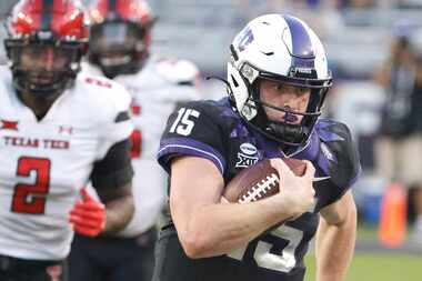 TCU quarterback Max Duggan (15) takes off past Texas Tech linebacker Brandon Bouyer-Randle...