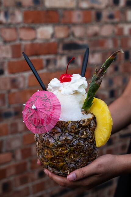 The Pina Alotta, made with house made pineapple and coconut syrup, whipped cream and vanilla...