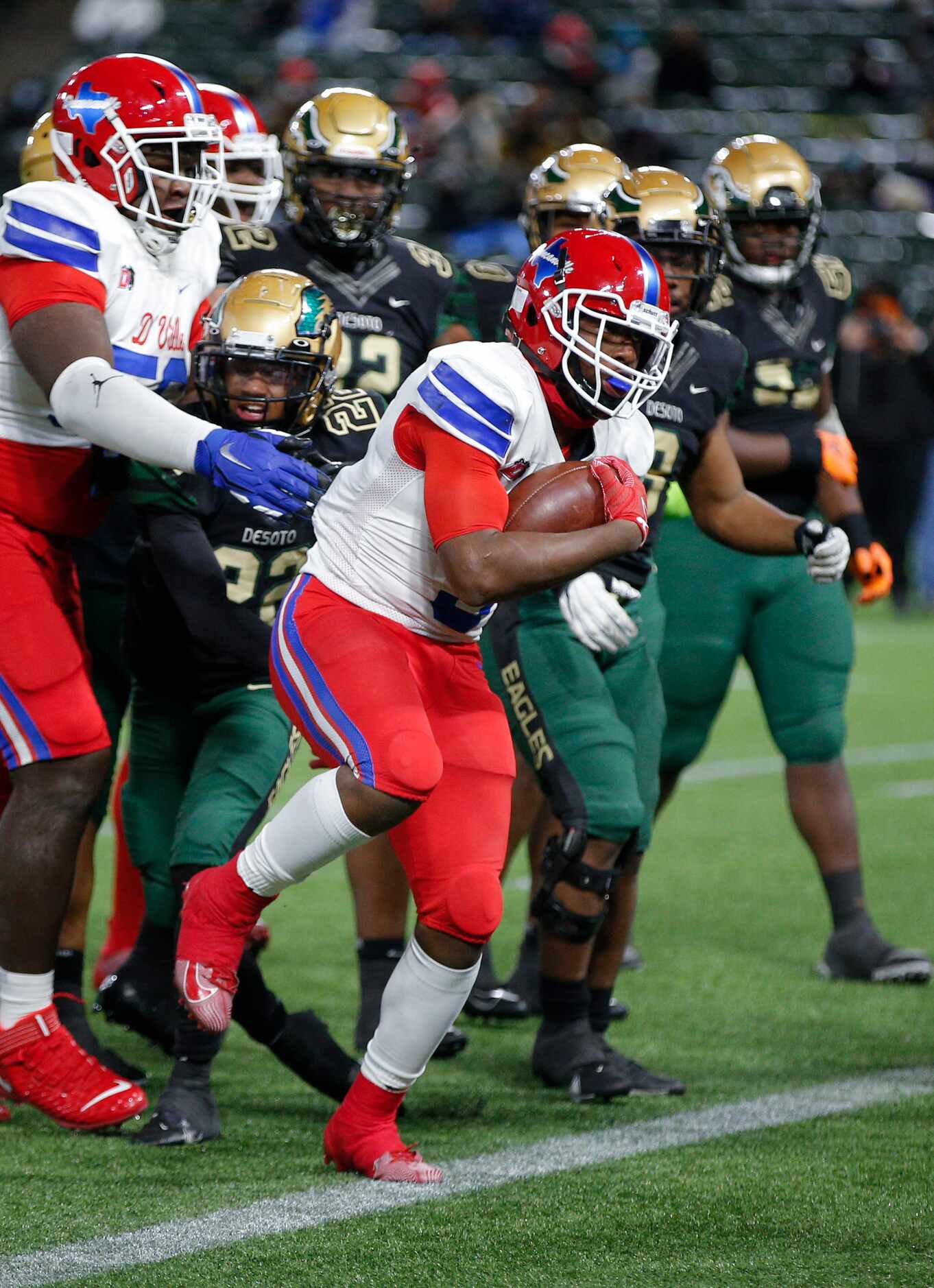Duncanville junior running back Malachi Medlock scores a touchdown during the first half of...
