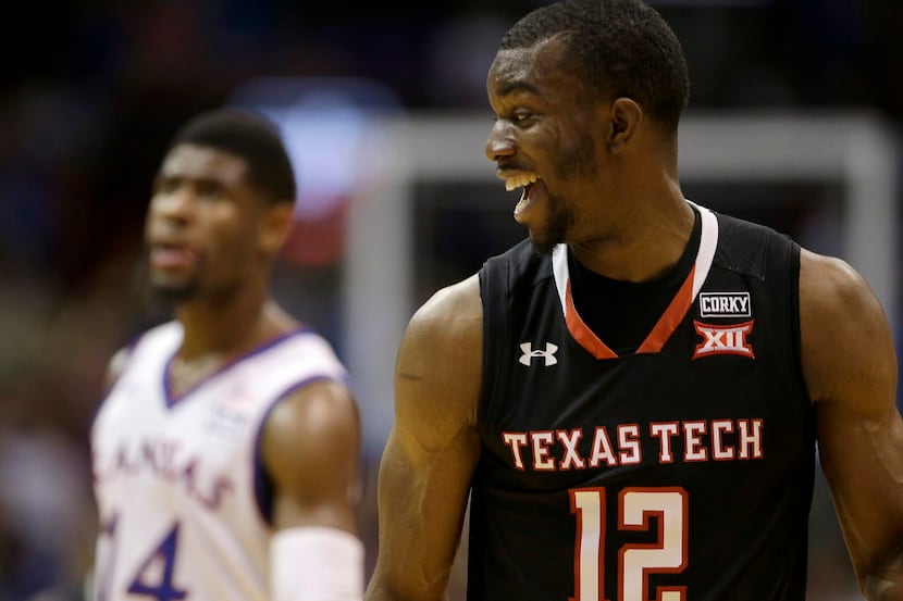 Texas Tech's Keenan Evans (12) celebrates after making a shot during the second half of the...
