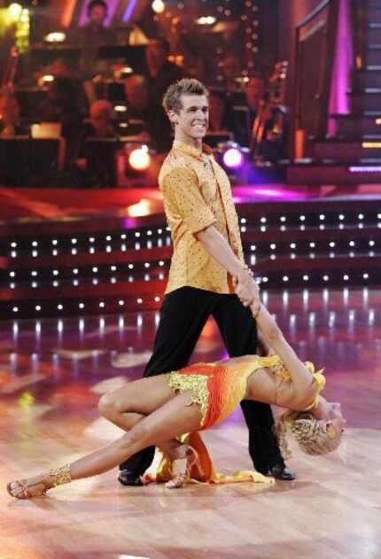 Cody Linley and his partner Julianne Hough compete during the semi-finals of "Dancing with...