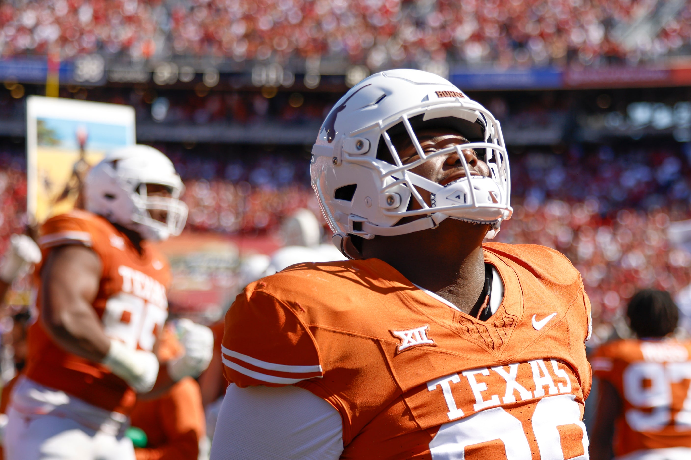 Texas defensive lineman Sydir Mitchell hype up the crowd during the second half of Red River...