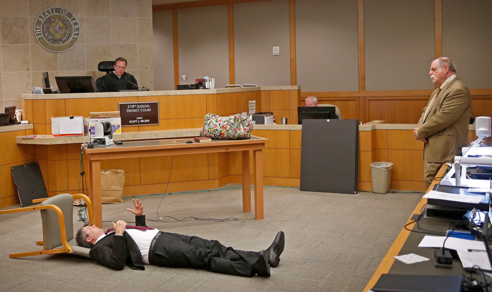 Defendant Jason Lowe (left) testifies about lying in bed with Jessie Bardwell after she...