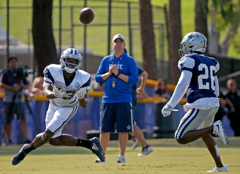 Dallas Cowboys wide receiver Michael Gallup (13) watches the pass over cornerback Duke...