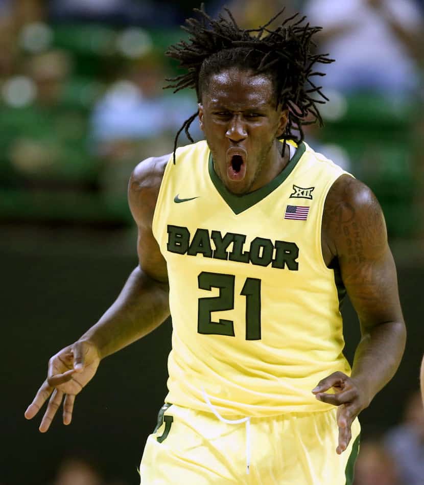 Baylor forward Taurean Prince reacts to a three-point shot against West Virginia in the...