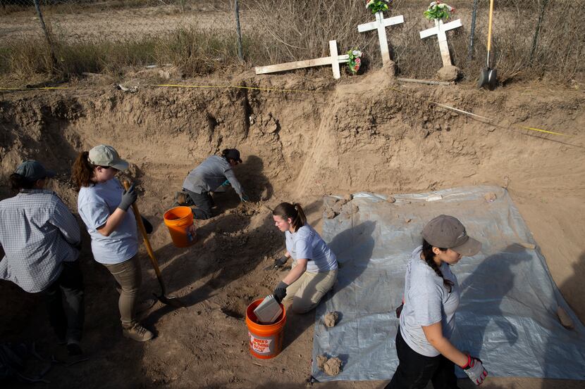 Anthropology students from Texas State University help to exhume the unidentified belongings...