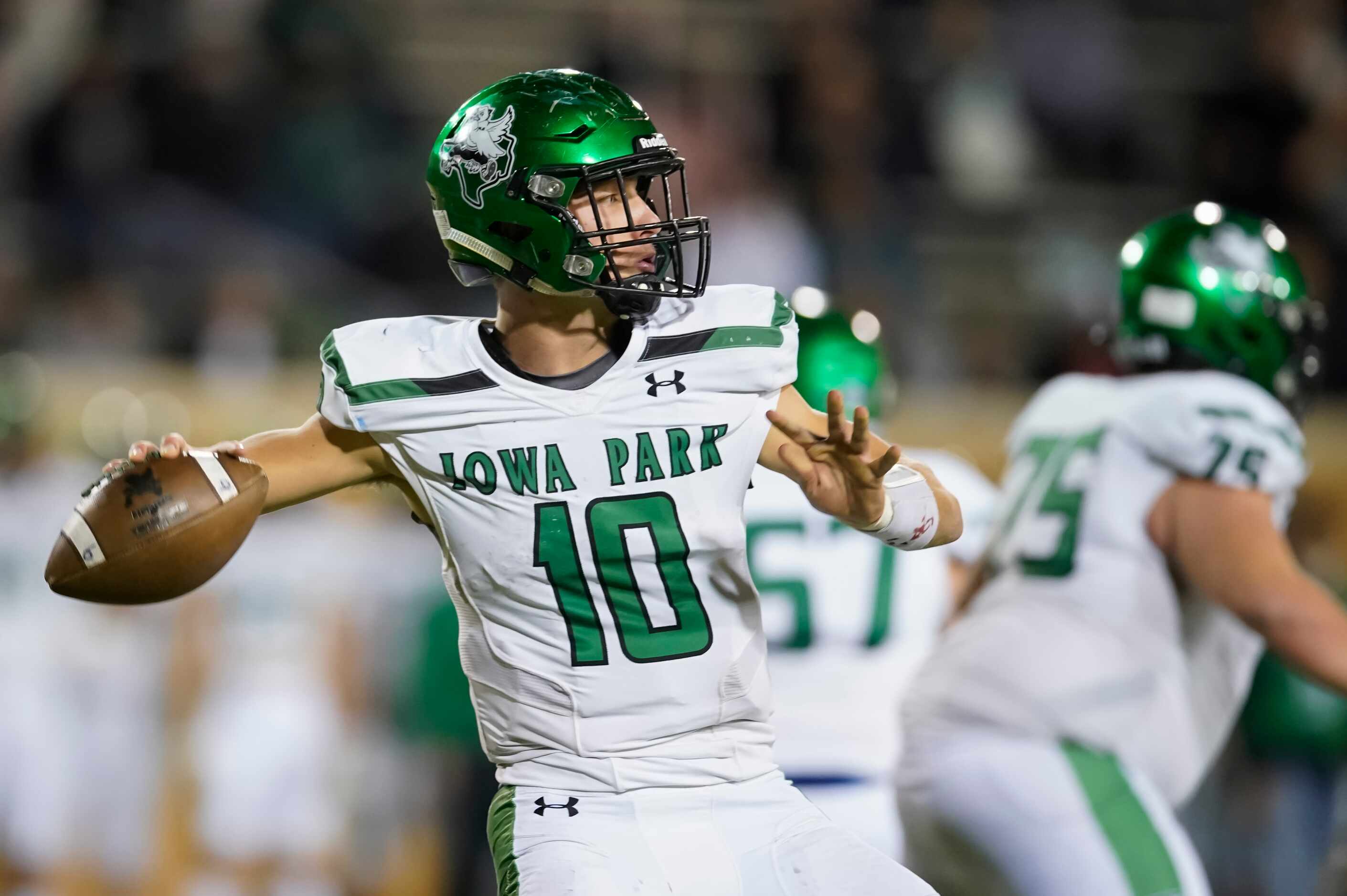 Iowa Park quarterback Cirby Coheley (10) throws a pass during the second quarter of a Class...