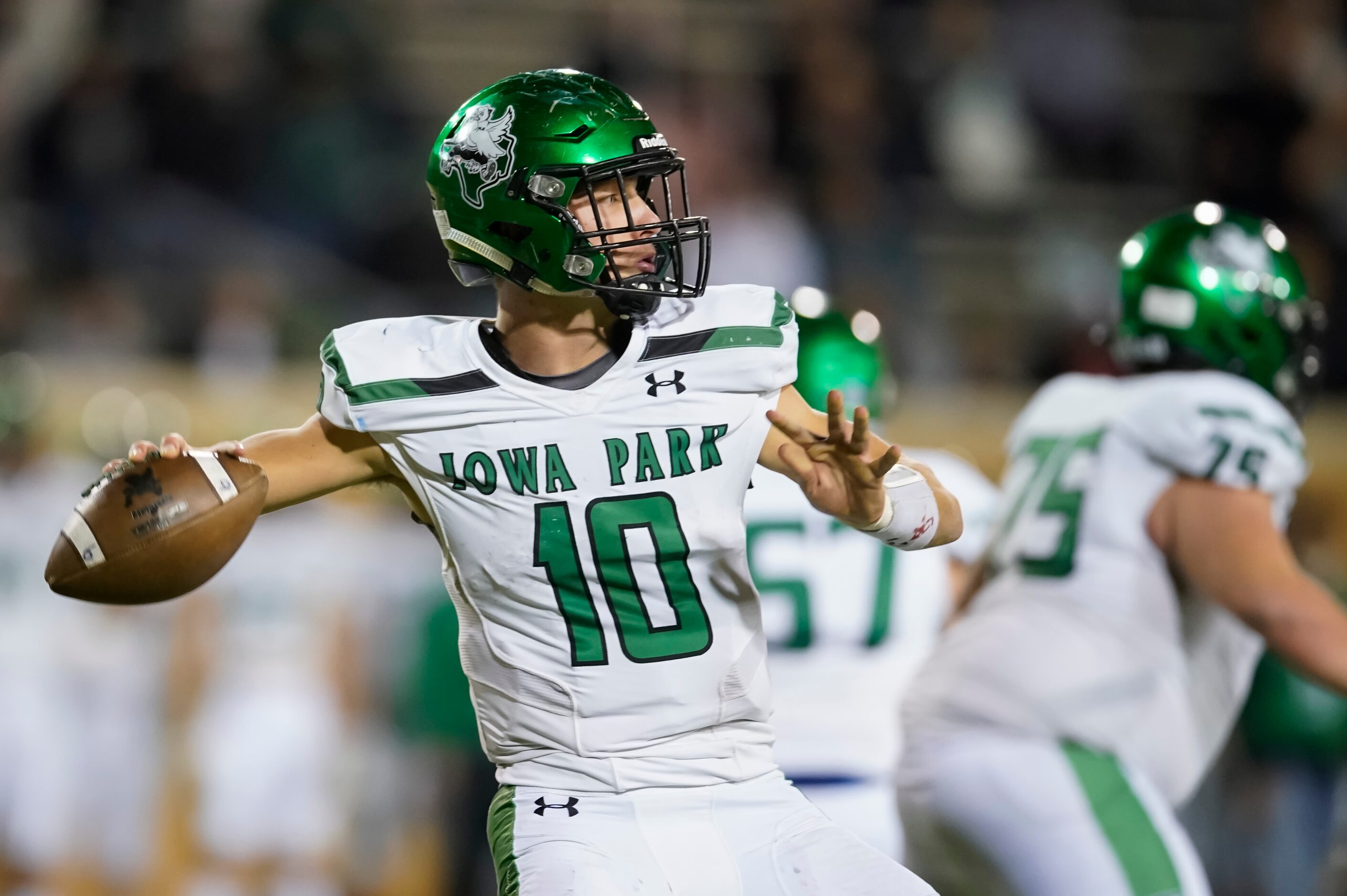 Iowa Park quarterback Cirby Coheley (10) throws a pass during the second quarter of a Class...