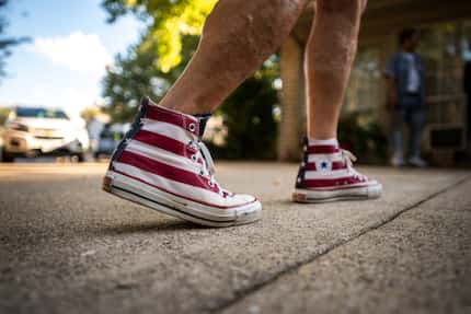 Kay Seamayer, 81, sports American flag Converse shoes while shooting hoops with younger...
