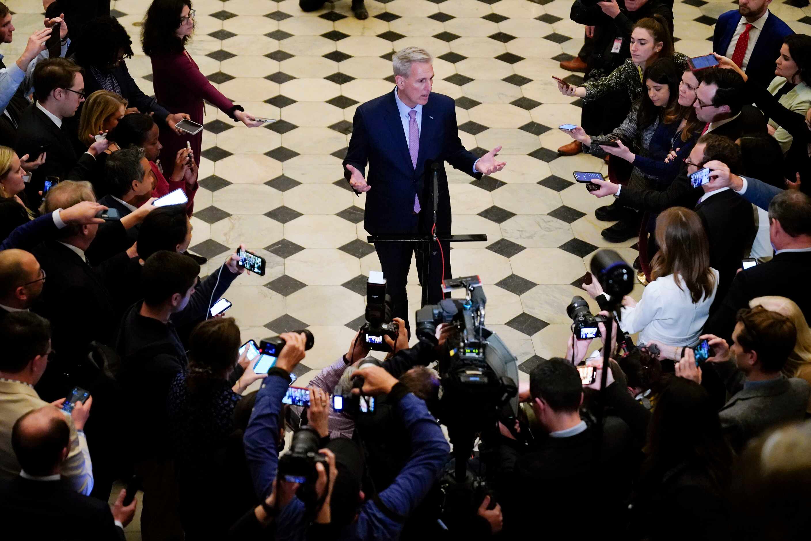 Newly-elected Speaker of the House Kevin McCarthy, R-Calif., talks to reporters after a...
