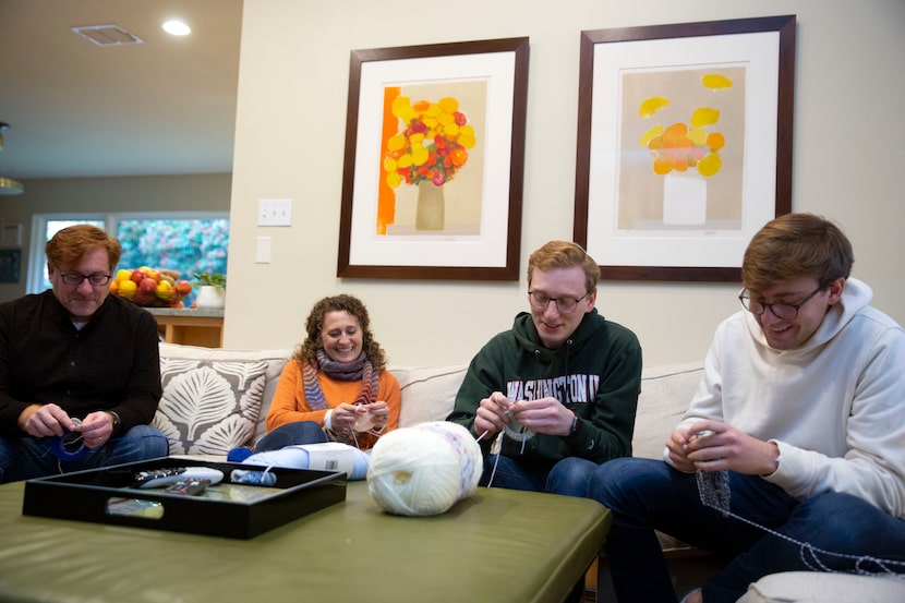 Knitting is a family affair for the Rosemans: Michael (from left), Amy, and their...