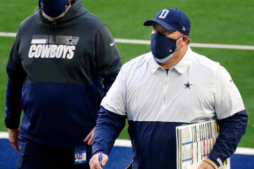 Dallas Cowboys head coach Mike McCarthy walks to locker room during halftime against the San...