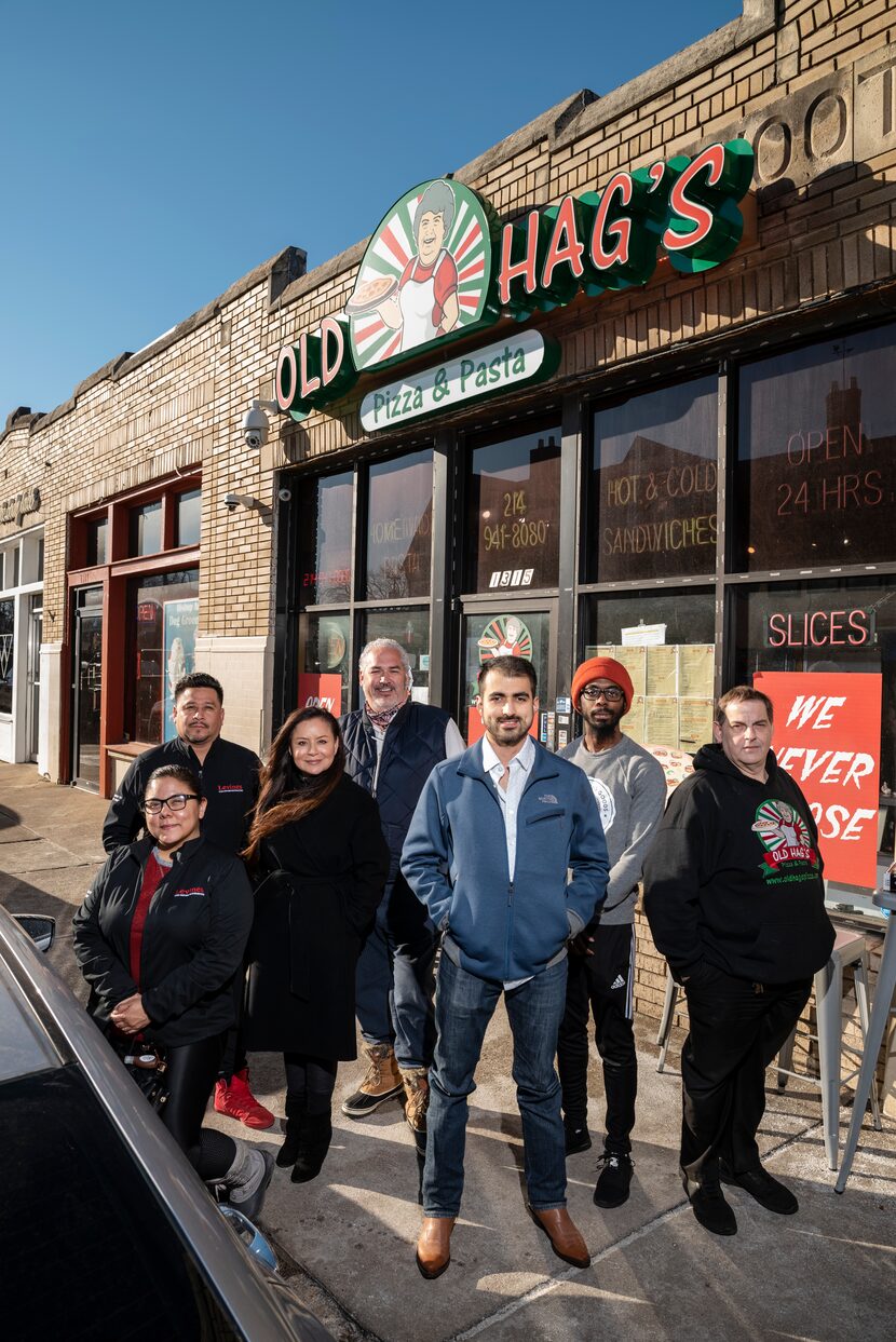 Ivan Loza (front and center) and a group of local businesspeople gathered outside of Old...