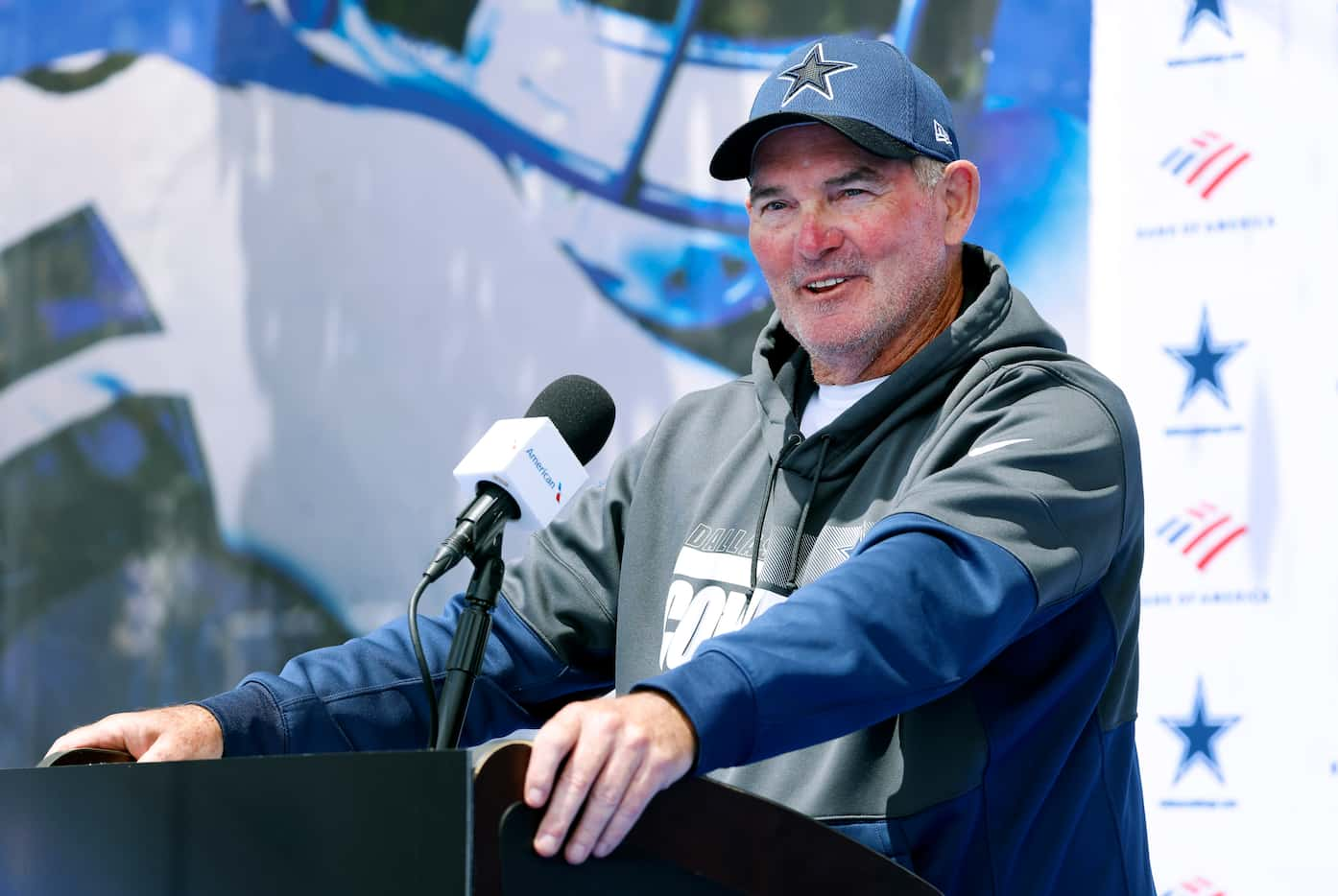 Dallas Cowboys defensive coordinator Mike Zimmer answers questions from the media following...