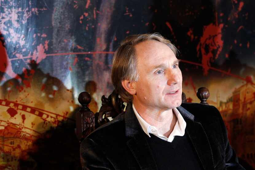 Dan Brown answers question during a news conference in Prague, Czech Republic.