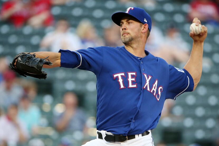 Texas Rangers starting pitcher Mike Minor (36) pitches in a Major League Baseball game...