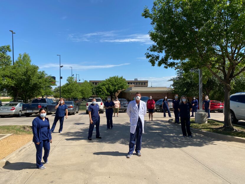 Cornea Associates of Texas workers gathered to watch the Blue Angels flyover in May. The...