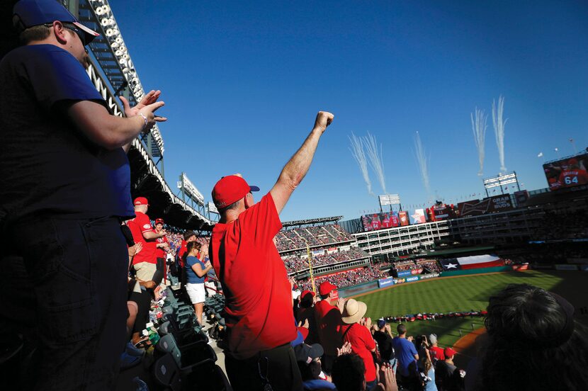 Fans and fireworks celebrate Opening Day for the Texas Rangers as the team takes on the...