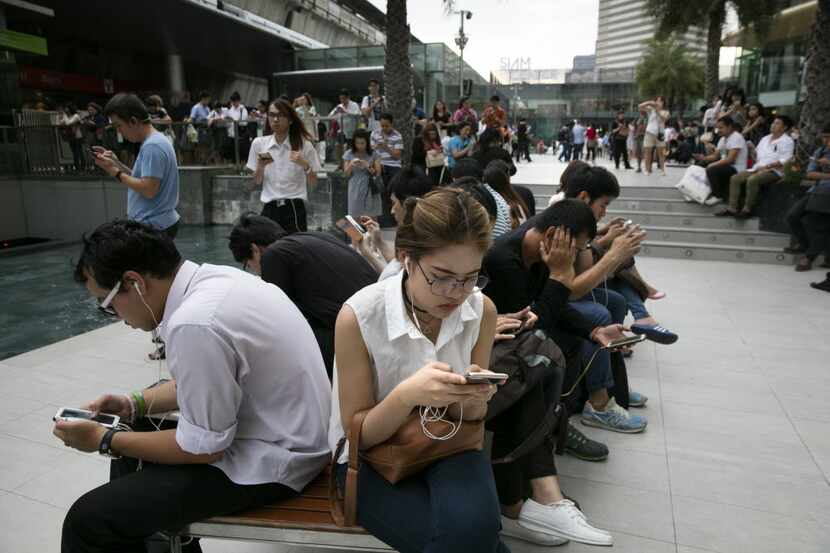 People gathered outside a major shopping mall to play Pokemon in Bangkok, Thailand, in August. 